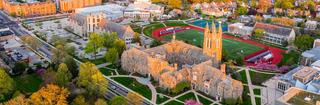 Aerial view of Saint Joseph's University campus with Philadelphia skyline in the background