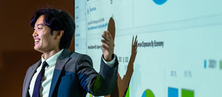 A business students presents data visualizations and analysis