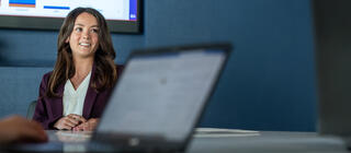 A Saint Joseph's University student presents an analysis of data at their internship