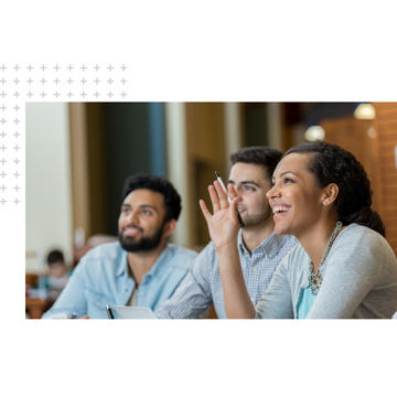 Graduate students in class studying